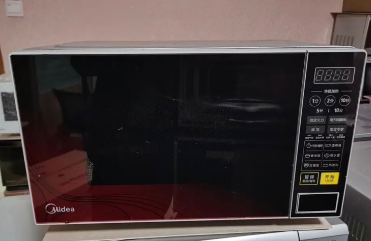家用急转美的转盘微波炉