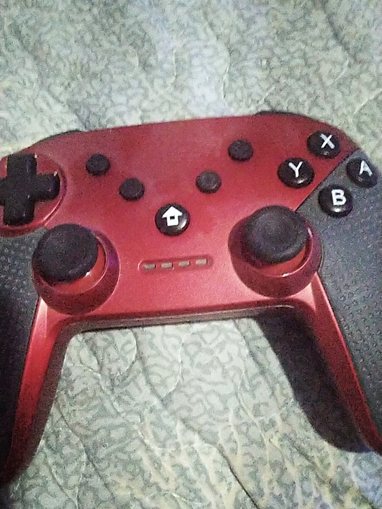 不知什么品牌的无线蓝牙手柄,一切正常,以前...