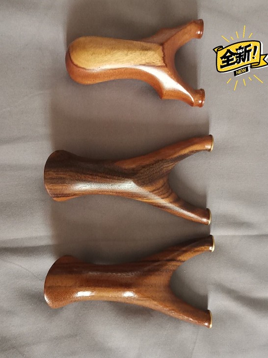 处理几把木制弹弓,弓门依次是69,74,7...