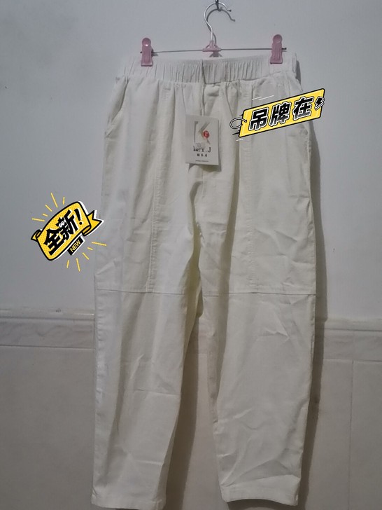 纯白色的裤子,吊牌在,全新,搭配什么颜色衣...