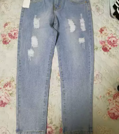fashion  jeans破洞小脚七分牛...