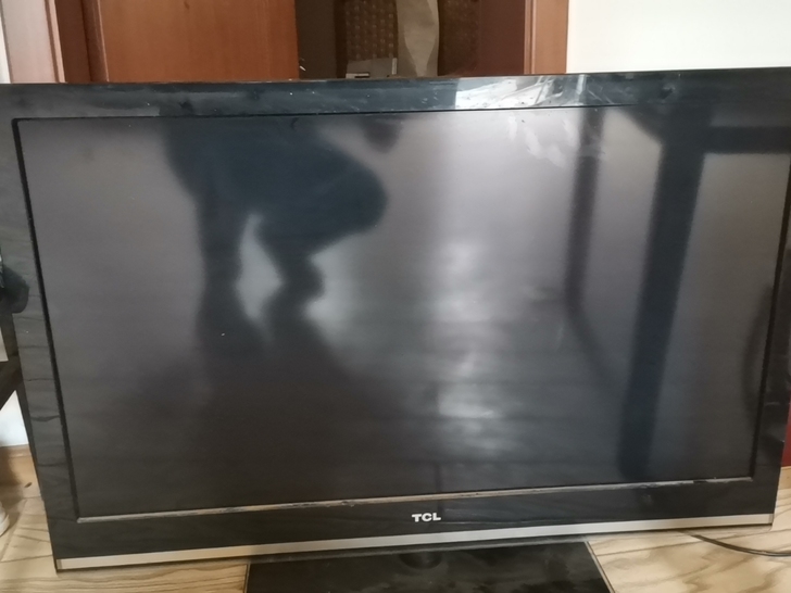 Tcl40寸液晶电视 遥控不见了 中间有一...