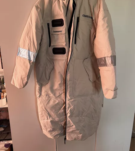 鸭鸭长款羽绒服全新。XL码男士白色。一经售...
