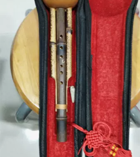 葫芦丝。真实拍摄,在专卖店买的,没有用过,...